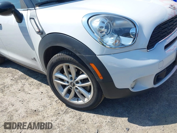 2014 MINI Countryman S z VIN WMWZC5C52EWP39083, wystawiony jako IAAI lot #42409957 z przebiegiem 73 497 mil mil oraz . Historia ofert i sprzedaży dostępna na DreamBid. Obrazek 6.