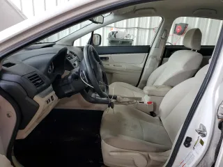 2012 Subaru Impreza Premium with VIN JF1GPAC6XCH246534, listed as a Copart auction lot 61001935 with 141,728 mi miles and Salvage title. Bid and sale history available at DreamBid. Image 7.