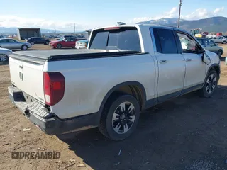 2020 Honda Ridgeline RTL with VIN 5FPYK3F50LB028430, listed as a IAAI auction lot 42033090 with Not provided miles and . Bid and sale history available at DreamBid. Image 4.