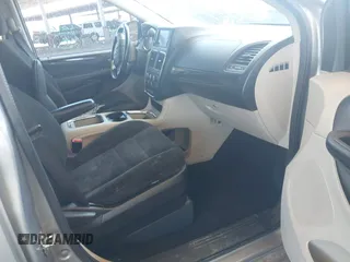2016 Dodge Grand Caravan SXT with VIN 2C4RDGCG9GR323668, listed as a IAAI auction lot 42025601 with 125,351 mi miles and . Bid and sale history available at DreamBid. Image 5.