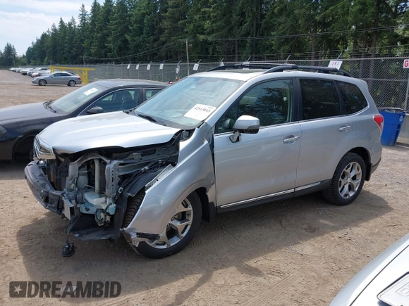 2015 Subaru Forester Touring with VIN JF2SJAWC6FH546472, listed as a IAAI auction lot 42513843 with 107,951 mi miles and . Bid and sale history available at DreamBid. Image 14.