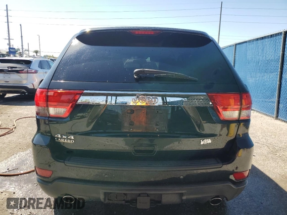 2012 Jeep Grand Cherokee Laredo with VIN 1C4RJFAT8CC307774, listed as a Copart auction lot 48368725 with 84,549 mi miles and Salvage Title. Bid and sale history available at carsss.com. Image 6.