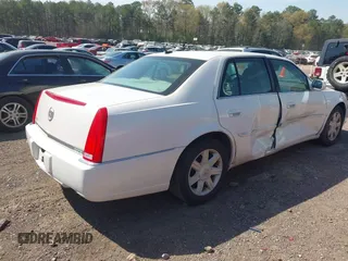 2006 Cadillac DTS w/1SC with VIN 1G6KD57Y56U132648, listed as a IAAI auction lot 41862030 with 128,003 mi miles. Bid and sale history available at carsss.com. Image 4.