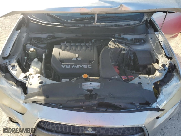 2010 Mitsubishi Outlander GT with VIN JA4JT5AX3AZ003941, listed as a Copart auction lot 59447484 with 148,509 mi miles and Salvage Title. Bid and sale history available at carsss.com. Image 12.