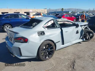 2023 BMW M2 with VIN 3MF13DM06P8D49660, listed as a IAAI auction lot 41279067 with 14,795 mi miles. Bid and sale history available at carsss.com. Image 4.
