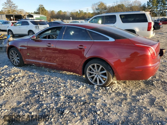 2012 Jaguar XJ with VIN SAJWA1CB3CLV37685, listed as a Copart auction lot 87586005 with 59,885 mi miles and Salvage title. Bid and sale history available at DreamBid. Image 2.
