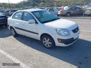 2009 Kia Rio SX with VIN KNADE223696518580, listed as a IAAI auction lot 41990650 with 1 mi miles. Bid and sale history available at carsss.com. Image 1.