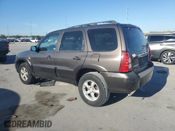 2006 Mazda Tribute S with VIN 4F2YZ04106KM28191, listed as a Copart auction lot 83150994 with 126,536 mi miles and Clean Title. Bid and sale history available at DreamBid. Image 2.