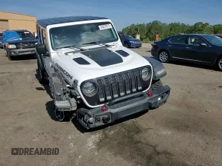 2020 Jeep Wrangler Unlimited Recon with VIN 1C4HJXFN2LW253771, listed as a Copart auction lot 54837675 with 98,935 mi miles and Salvage title. Bid and sale history available at DreamBid. Image 14.