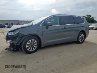 2023 Chrysler Pacifica Hybrid Touring L with VIN 2C4RC1L72PR614075, listed as a Copart auction lot 58586115 with 43,960 mi miles and Salvage title. Bid and sale history available at DreamBid. Image 1.
