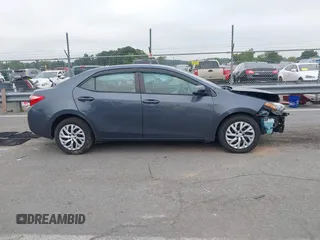 2018 Toyota Corolla L with VIN 2T1BURHE1JC007046, listed as a IAAI auction lot 42417100 with 69,845 mi miles and . Bid and sale history available at DreamBid. Image 13.