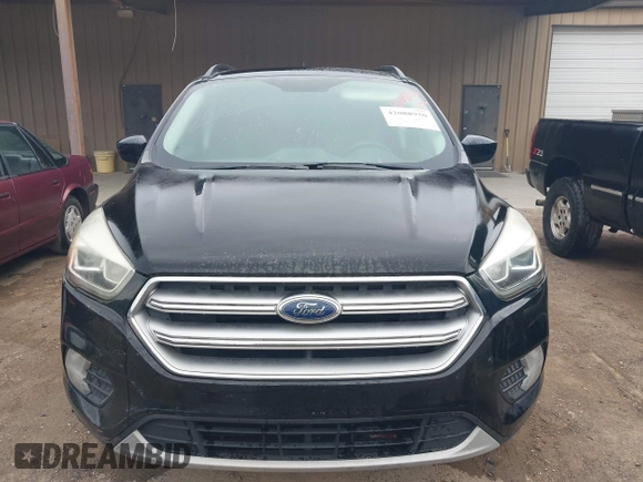2017 Ford Escape SE with VIN 1FMCU9GD6HUB90367, listed as a IAAI auction lot 42088930 with 145,286 mi miles and . Bid and sale history available at DreamBid. Image 6.