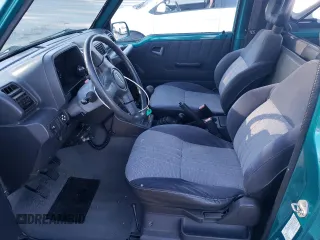 1995 Suzuki Sidekick z VIN 2S3TA02C3S6414337, wystawiony jako Copart lot #86304134 z przebiegiem 104 889 mil mil oraz Szkody całkowita. Historia ofert i sprzedaży dostępna na DreamBid. Obrazek 7.