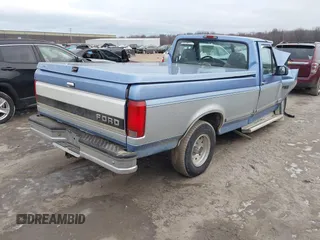 1996 Ford F-150 Special with VIN 1FTEF15NXTLC10297, listed as a IAAI auction lot 41504038 with 120,251 mi miles. Bid and sale history available at carsss.com. Image 4.
