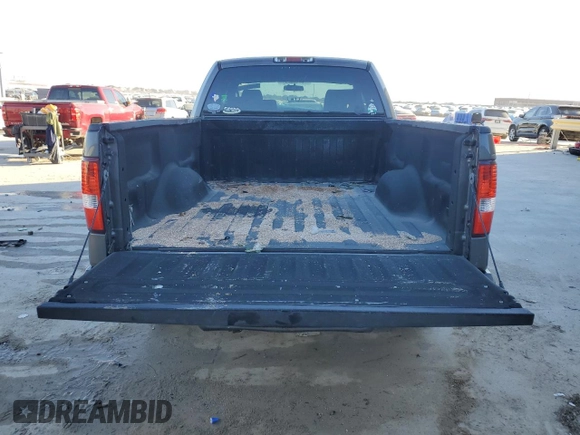 2007 Ford F-150 STX with VIN 1FTRX12W97KD12990, listed as a Copart auction lot 46939335 with 216,759 mi miles and Salvage Title. Bid and sale history available at DreamBid. Image 6.