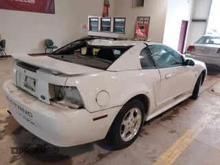 2003 Ford Mustang Standard with VIN 1FAFP40493F381211, listed as a IAAI auction lot 41814640 with 312,991 mi miles. Bid and sale history available at carsss.com. Image 4.