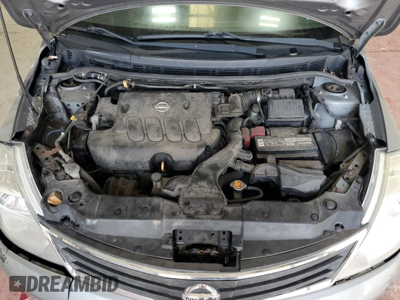 2011 Nissan Versa S z VIN 3N1BC1CP7BL409393, wystawiony jako Copart lot #60806585 z przebiegiem 147 149 mil mil oraz Szkoda całkowita • Salvage title. Historia ofert i sprzedaży dostępna na DreamBid. Obrazek 11.