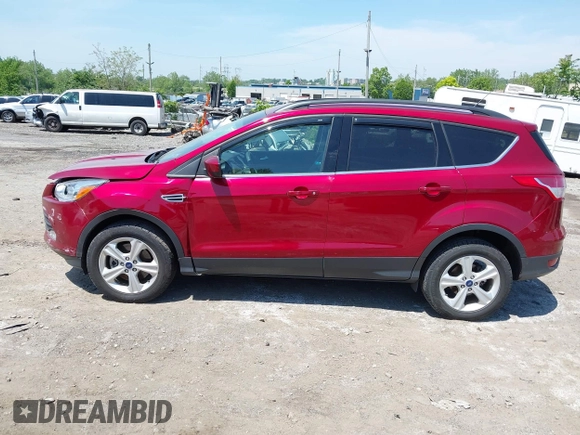 2016 Ford Escape SE z VIN 1FMCU9GX1GUC04815, wystawiony jako IAAI lot #42235499 z przebiegiem 84 713 mil mil oraz . Historia ofert i sprzedaży dostępna na DreamBid. Obrazek 14.