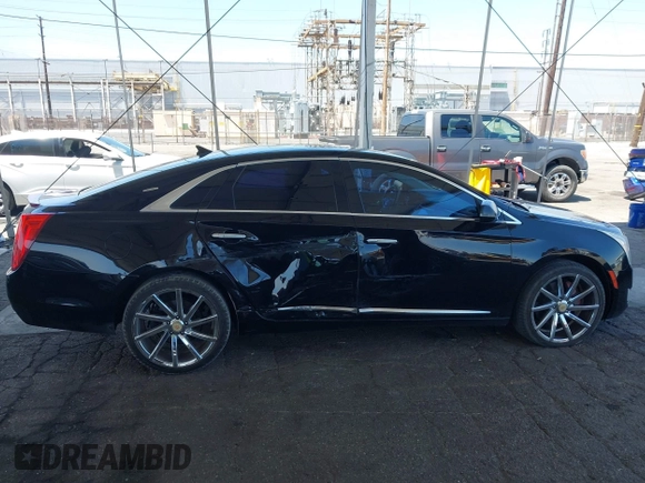 2013 Cadillac XTS Luxury with VIN 2G61P5S35D9105460, listed as a IAAI auction lot 42582313 with 144,895 mi miles and . Bid and sale history available at DreamBid. Image 13.