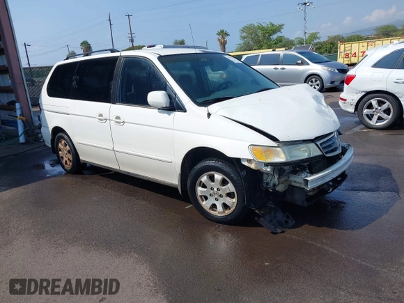 2002 Honda Odyssey EX z VIN 2HKRL18632H556791, wystawiony jako IAAI lot #41562553 z przebiegiem 222 976 mil mil oraz . Historia ofert i sprzedaży dostępna na DreamBid. Obrazek 1.