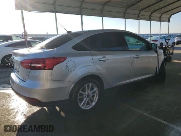 2016 Ford Focus SE с VIN 1FADP3F23GL348493, выставлен на аукционе Copart как лот 50792195 с пробегом 135 535 миль миль и Списание • Salvage title. История ставок и продаж доступна на DreamBid. Изображение 3.