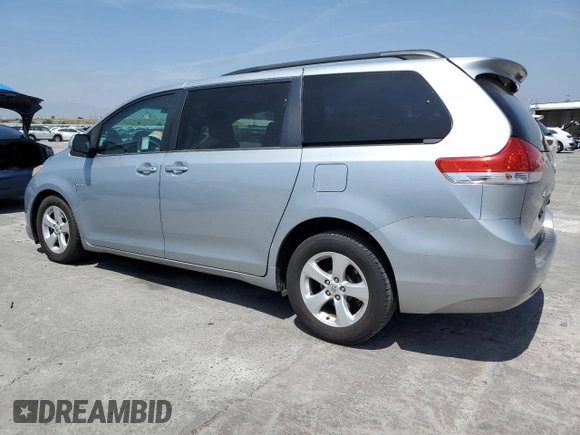 2014 Toyota Sienna LE AAS with VIN 5TDKK3DC1ES504232, listed as a Copart auction lot 54169005 with 103,724 mi miles and Salvage Title. Bid and sale history available at DreamBid. Image 2.