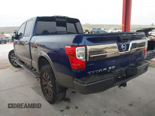 2016 Nissan Titan Platinum Reserve z VIN 1N6BA1F20GN509360, wystawiony jako IAAI lot #41921670 z przebiegiem 164 784 mil mil oraz . Historia ofert i sprzedaży dostępna na DreamBid. Obrazek 3.