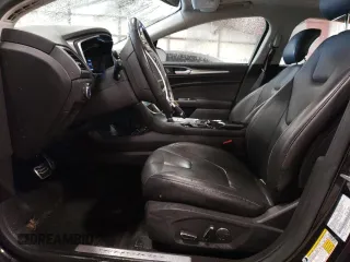2014 Ford Fusion Titanium Hybrid z VIN 3FA6P0RUXER168706, wystawiony jako Copart lot #55362295 z przebiegiem 136 382 mil mil oraz Czysty tytuł • Clean title. Historia ofert i sprzedaży dostępna na DreamBid. Obrazek 7.