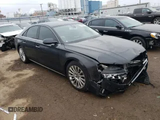 2015 Audi A8 4.0T with VIN WAUJ2AFD3FN024977, listed as a Copart auction lot 39952623 with 102,365 mi miles and . Bid and sale history available at DreamBid. Image 4.