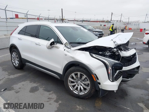 2022 Cadillac XT4 FWD Premium Luxury with VIN 1GYFZCR49NF100393, listed as a IAAI auction lot 42497187 with 23,672 mi miles and . Bid and sale history available at DreamBid. Image 1.