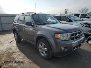 2012 Ford Escape Limited z VIN 1FMCU0EG1CKB30638, wystawiony jako Copart lot #52905205 z przebiegiem 169 683 mil mil oraz Szkoda całkowita • Salvage title. Historia ofert i sprzedaży dostępna na DreamBid. Obrazek 4.