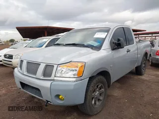 2006 Nissan Titan XE with VIN 1N6AA06B86N500376, listed as a IAAI auction lot 41771575 with 141,725 mi miles. Bid and sale history available at carsss.com. Image 2.