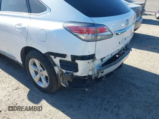 2015 Lexus RX 350 z VIN 2T2BK1BA4FC305879, wystawiony jako IAAI lot #42665618 z przebiegiem 104 532 mil mil oraz . Historia ofert i sprzedaży dostępna na DreamBid. Obrazek 6.