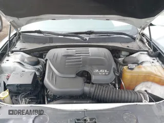 2013 Dodge Charger SE with VIN 2C3CDXBG1DH742921, listed as a IAAI auction lot 41765001 with 196,783 mi miles and . Bid and sale history available at DreamBid. Image 10.