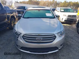 2015 Ford Taurus SEL with VIN 1FAHP2E84FG189640, listed as a IAAI auction lot 41814795 with 100,209 mi miles and . Bid and sale history available at DreamBid. Image 12.