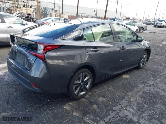 2022 Toyota Prius L Eco with VIN JTDKAMFU7N3155268, listed as a IAAI auction lot 41589024 with 158,430 mi miles. Bid and sale history available at carsss.com. Image 4.