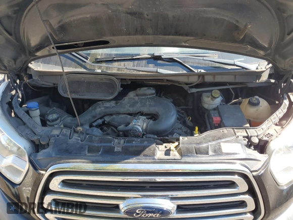 2016 Ford Transit Cargo with VIN 1FTYR1CM5GKB47409, listed as a Copart auction lot 64859095 with 193,066 mi miles and Clean title. Bid and sale history available at DreamBid. Image 12.