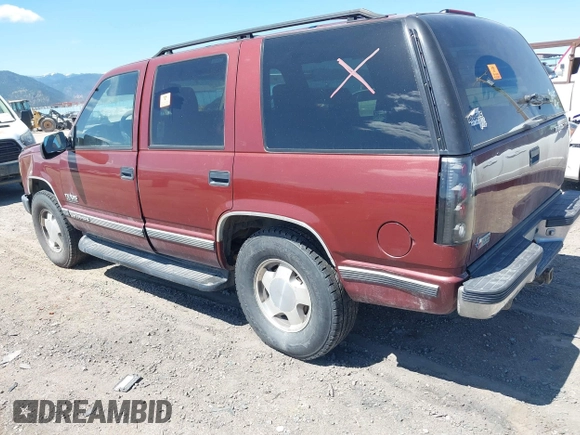 1999 Chevrolet Tahoe Z71 with VIN 1GNEK13R4XJ341736, listed as a IAAI auction lot 42218712 with 282,663 mi miles and . Bid and sale history available at DreamBid. Image 3.