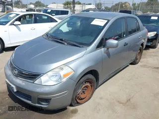 2011 Nissan Versa S with VIN 3N1BC1AP0BL393704, listed as a IAAI auction lot 42334003 with 164,394 mi miles and . Bid and sale history available at DreamBid. Image 2.