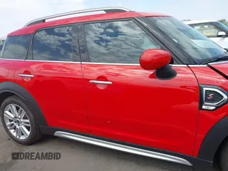2023 MINI Countryman Cooper S z VIN WMZ53BR02P3R00984, wystawiony jako IAAI lot #42744505 z przebiegiem 27 432 mil mil oraz . Historia ofert i sprzedaży dostępna na DreamBid. Obrazek 14.