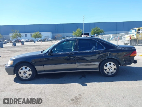 1998 Acura RL Special Edition with VIN JH4KA9686WC009959, listed as a IAAI auction lot 41632413 with 130,788 mi miles. Bid and sale history available at carsss.com. Image 15.
