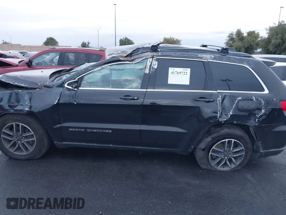 2019 Jeep Grand Cherokee Altitude with VIN 1C4RJEAGXKC826742, listed as a IAAI auction lot 41769722 with 91,905 mi miles and . Bid and sale history available at DreamBid. Image 13.