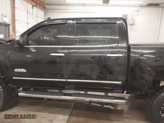 2015 Chevrolet Silverado 1500 High Country with VIN 3GCUKTEJXFG320011, listed as a IAAI auction lot 41366273 with 157,947 mi miles. Bid and sale history available at carsss.com. Image 14.