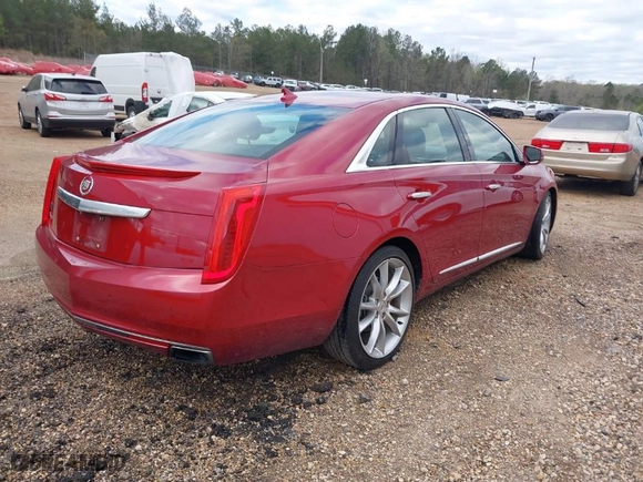 2013 Cadillac XTS Premium with VIN 2G61S5S35D9151997, listed as a IAAI auction lot 41835637 with 149,253 mi miles. Bid and sale history available at carsss.com. Image 4.