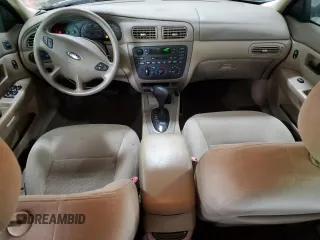 2003 Ford Taurus SE Standard with VIN 1FAFP53U83G228072, listed as a Copart auction lot 57486335 with 93,451 mi miles and Salvage title. Bid and sale history available at DreamBid. Image 8.