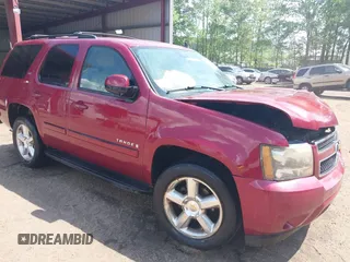 2007 Chevrolet Tahoe LTZ z VIN 1GNFK13057J135119, wystawiony jako IAAI lot #42150720 z przebiegiem 203 212 mil mil oraz . Historia ofert i sprzedaży dostępna na DreamBid. Obrazek 1.