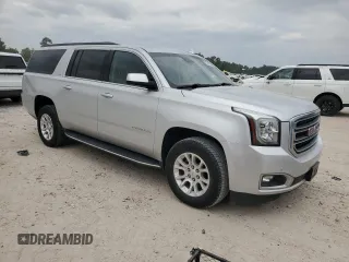 2019 GMC Yukon XL SLT with VIN 1GKS1GKC9KR288660, listed as a Copart auction lot 53510325 with 77,485 mi miles and Salvage Title. Bid and sale history available at carsss.com. Image 4.