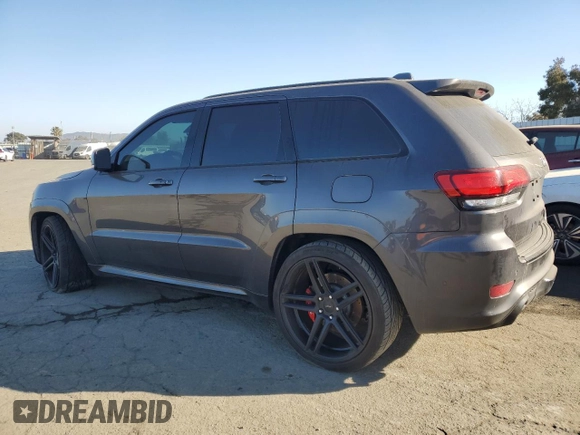 2017 Jeep Grand Cherokee SRT with VIN 1C4RJFDJ0HC645266, listed as a Copart auction lot 85089964 with 62,591 mi miles and Salvage Title. Bid and sale history available at carsss.com. Image 2.