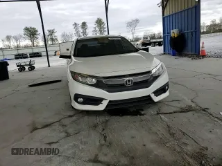 2017 Honda Civic EX-L z VIN 19XFC1F77HE013049, wystawiony jako Copart lot #49931525 z przebiegiem 124 721 mil mil oraz Szkoda całkowita • Salvage title. Historia ofert i sprzedaży dostępna na DreamBid. Obrazek 11.