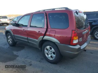 2001 Mazda Tribute LX with VIN 4F2CU08111KM19933, listed as a Copart auction lot 81174614 with 209,736 mi miles and Salvage Title. Bid and sale history available at DreamBid. Image 2.